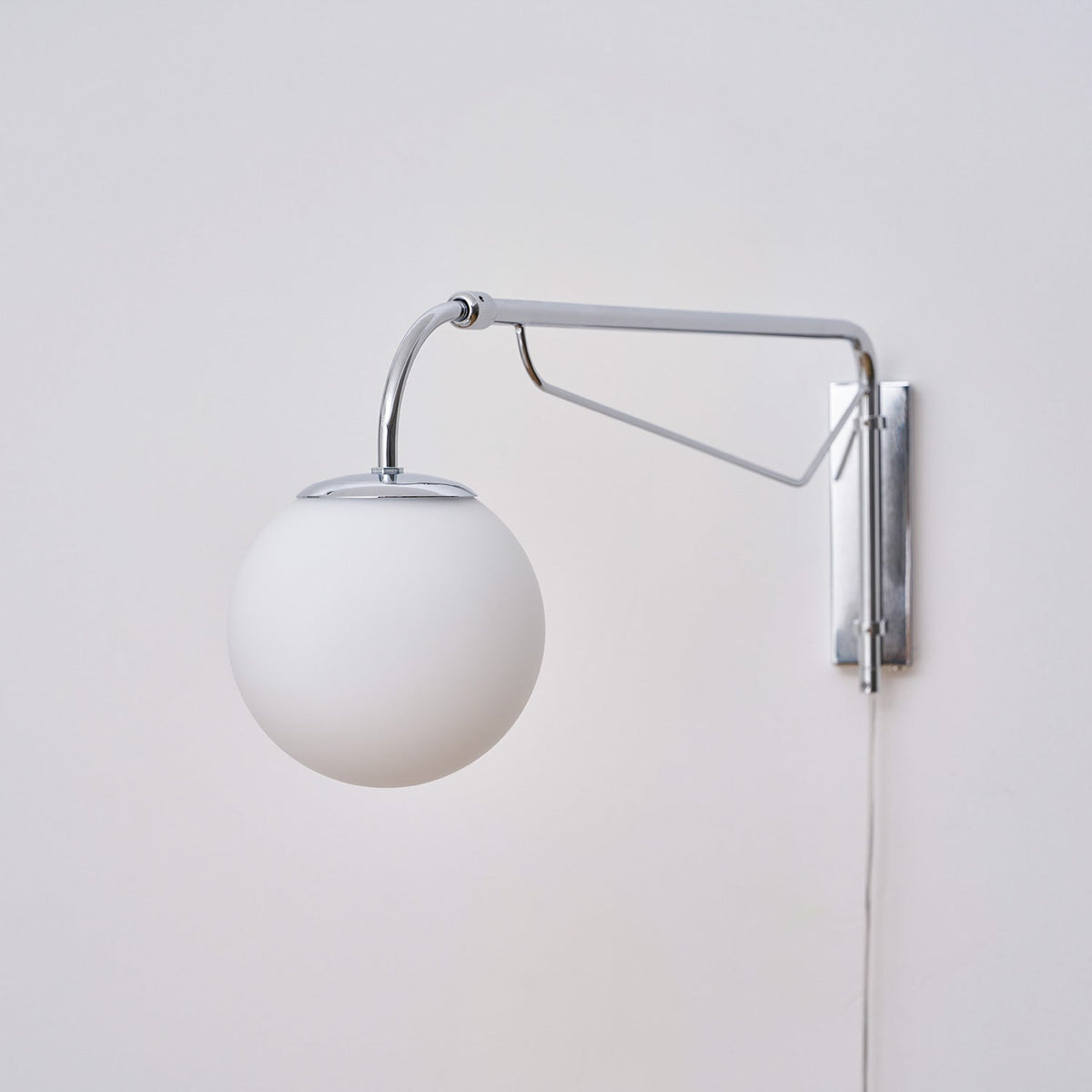 Bellman | Plug In Swing Arm Wall Lamp, Adjustable Globe Wall Sconce for Bedside Reading and Desk