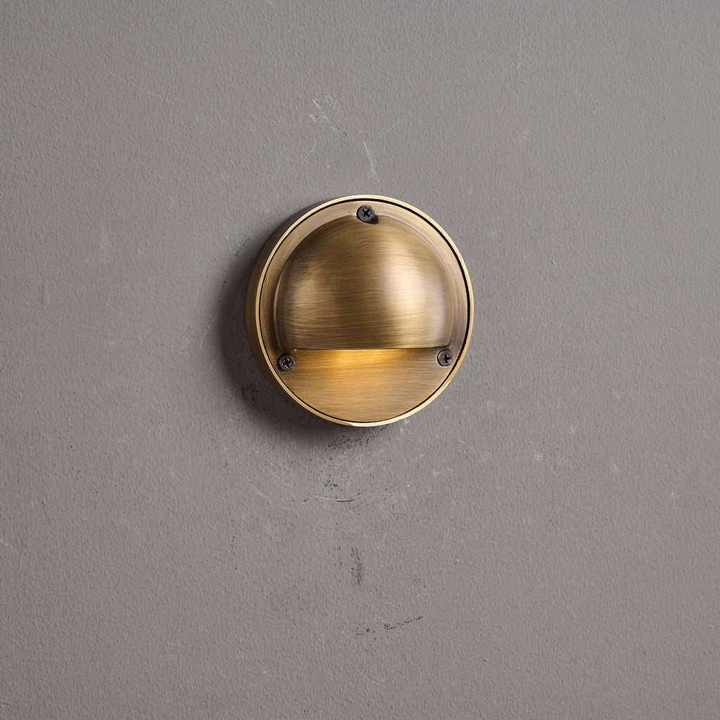 Cove | Brass Step Light, Eyelid Wall Light, Covered Porch