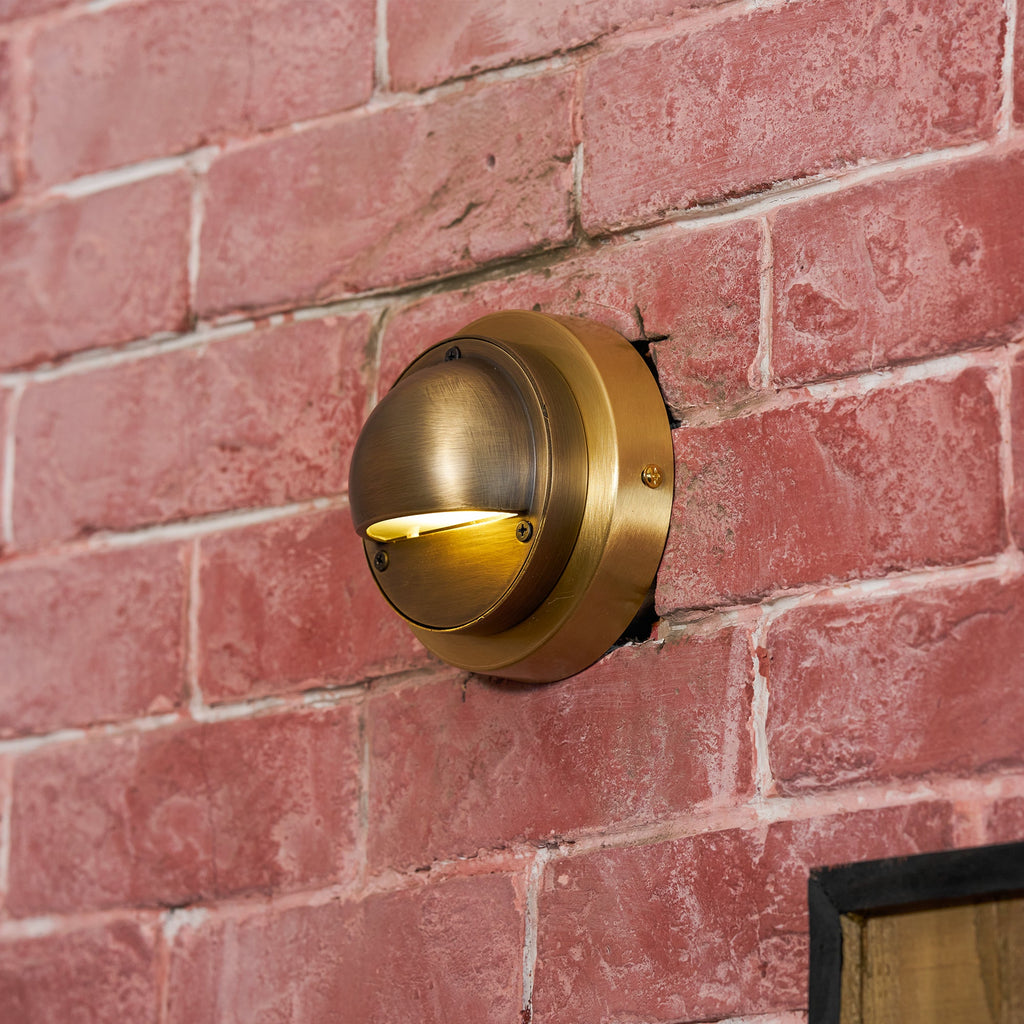 Cove | Brass Step Light, Eyelid Wall Light, Covered Porch