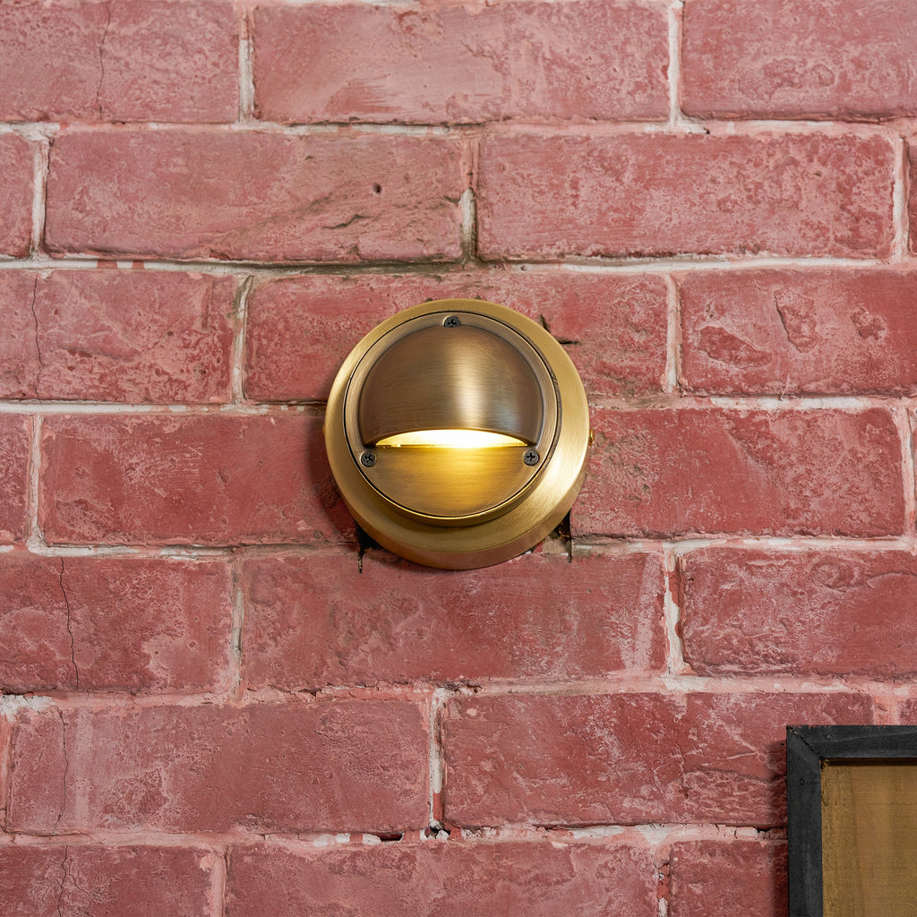 Cove | Brass Step Light, Eyelid Wall Light, Covered Porch