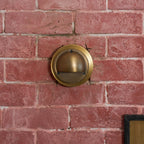Cove | Brass Step Light, Eyelid Wall Light, Covered Porch