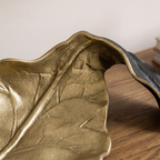 Close up of the raised vein casting and the antique gold to matte black edge of the Fern tray