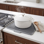 Rill used as a heatproof pot holder for a hot Dutch oven