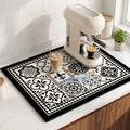 Tessa black and white tile coffee bar mat under an espresso machine