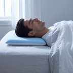 Man sleeping on his back on the Zia low profile pillow